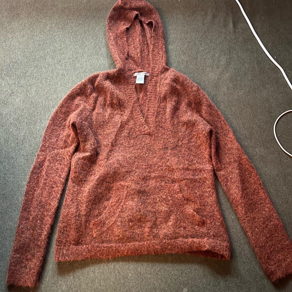 Burnt orange fuzzy sweater, with hood and pocket